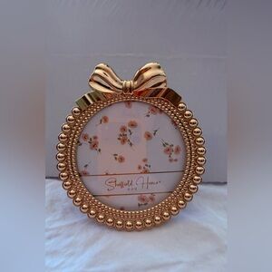 Sheffield Home Rose Gold Round metal Frame with Bow